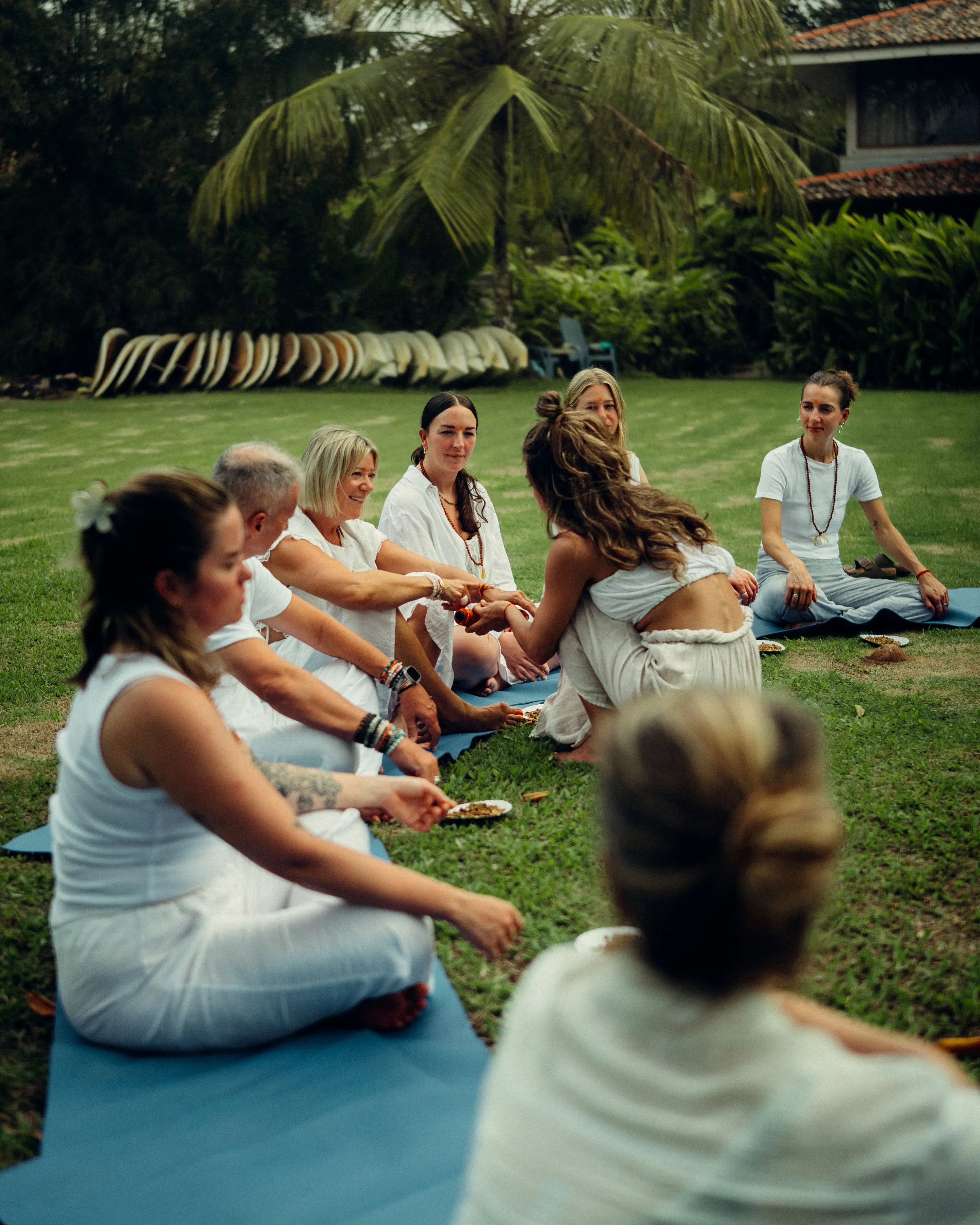 Practitioners moving together in the shala